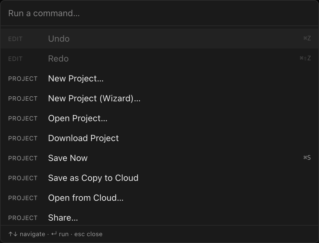 The command palette open over the app, showing category tags, command titles, and keybinding hints