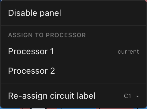 The panel context menu on a two-processor project: Disable panel, Assign to processor with the current canvas marked, and Re-assign circuit label with the circuit's current label