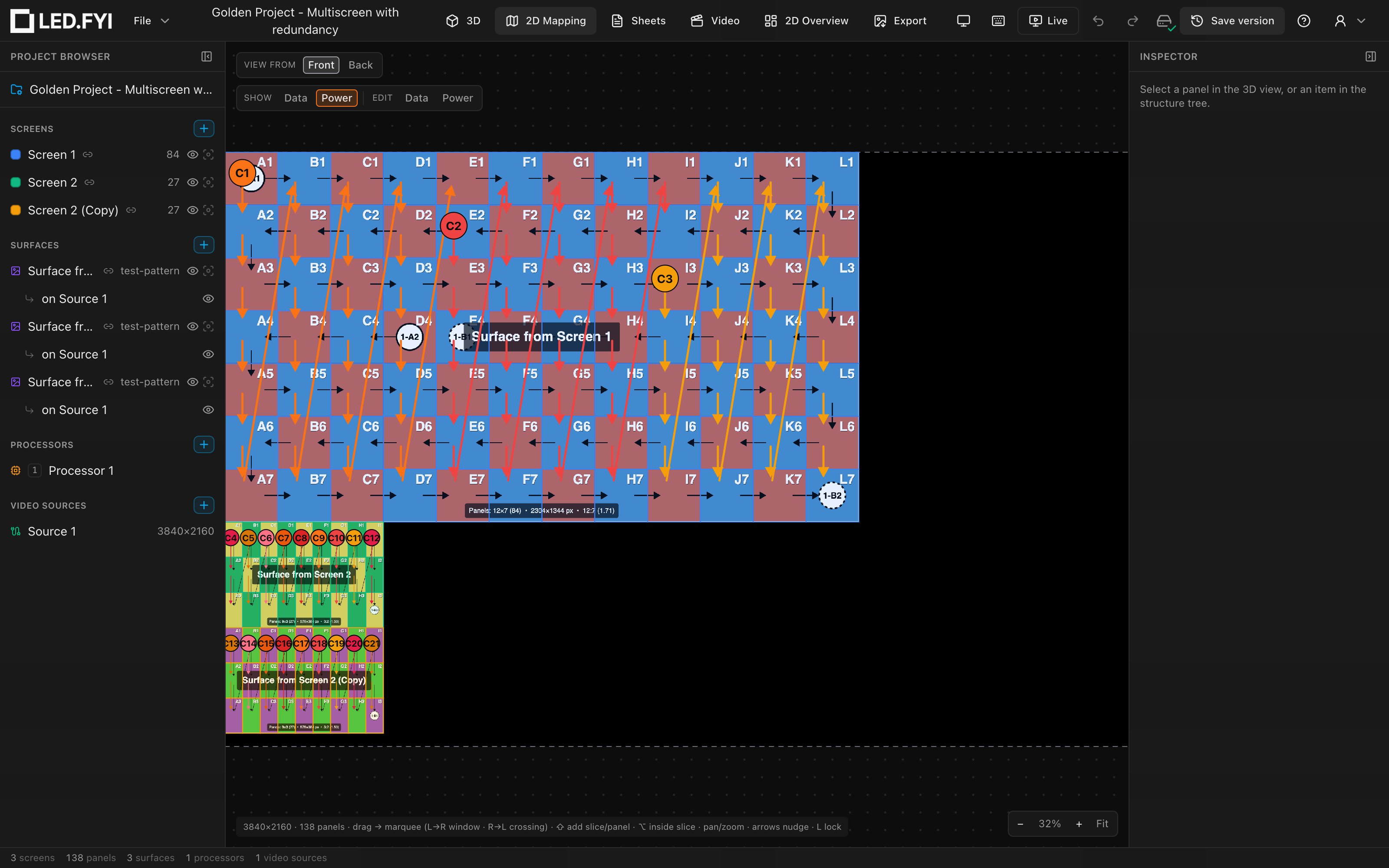 The power overlay on a three-screen project: daisy-chains in warm per-circuit colors with circuit chips C1–C3 on the large screen and C4–C21 across the two smaller screens